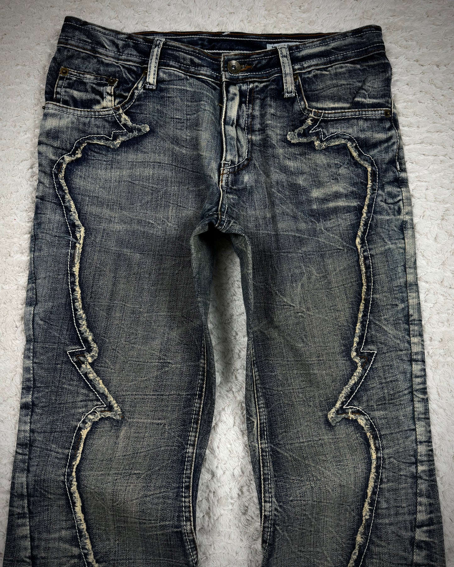 Semantic Design Studded Back Pocket Flared Jeans