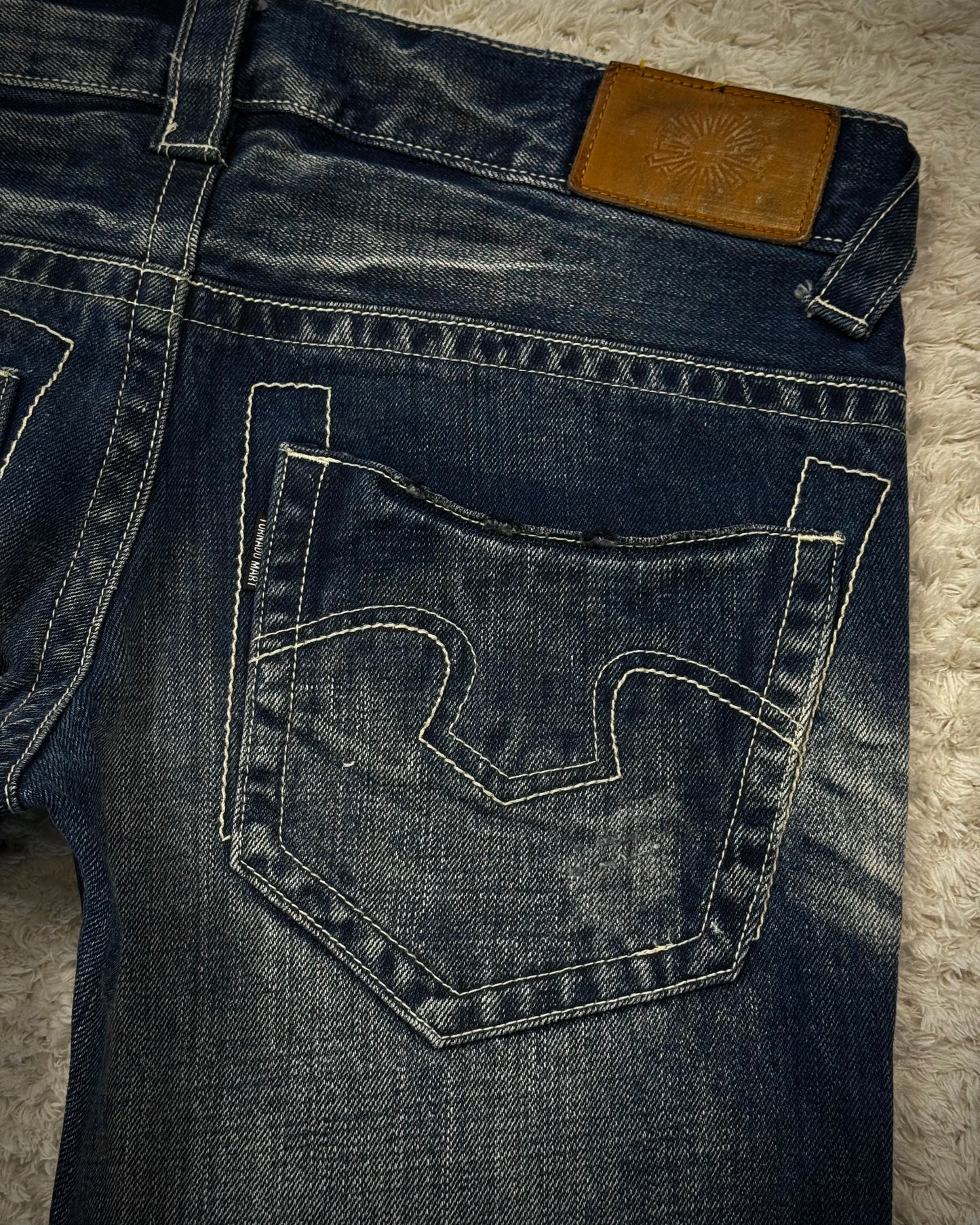 Tornado Mart Stitch Repaired Clawmarks Washed Spiral Flared Jeans