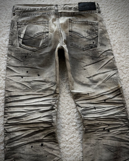 CavariA Leopard Repaired Clawmarks Bootcut Jeans