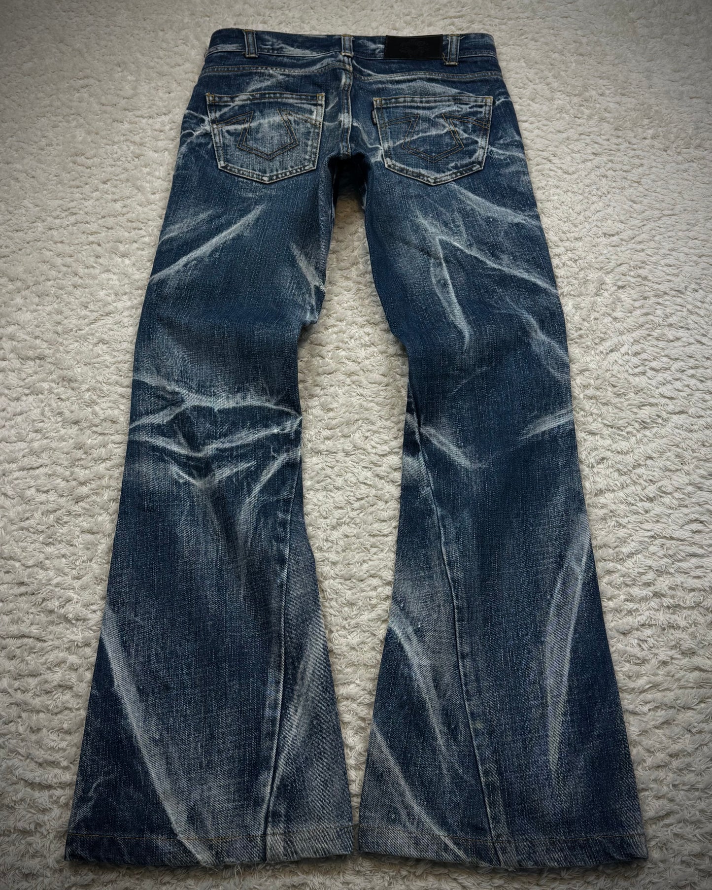 Tornado Mart Clawmarks Washed Spiral Flared Jeans