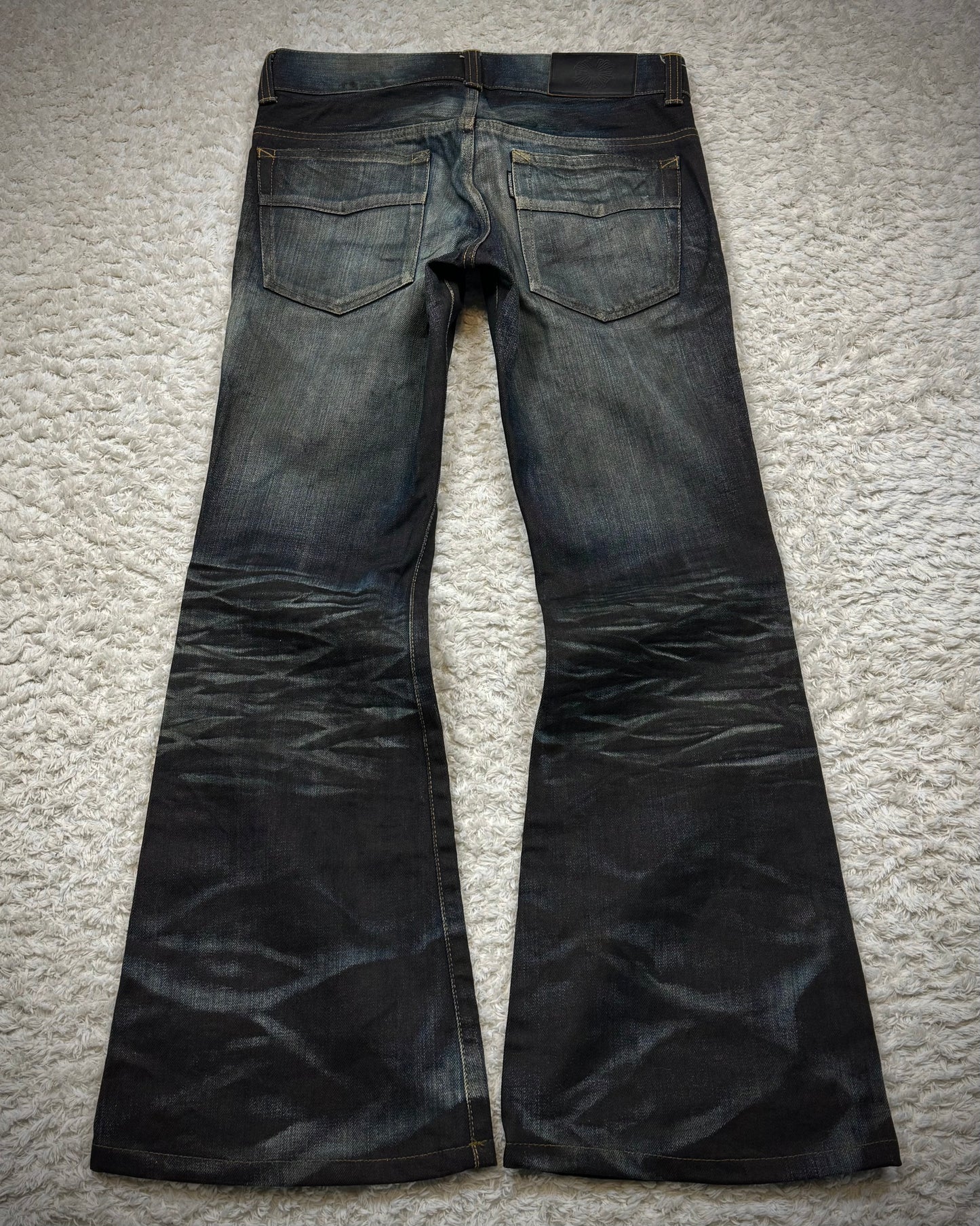 Tornado Mart Clawmarks Coated Flared Jeans