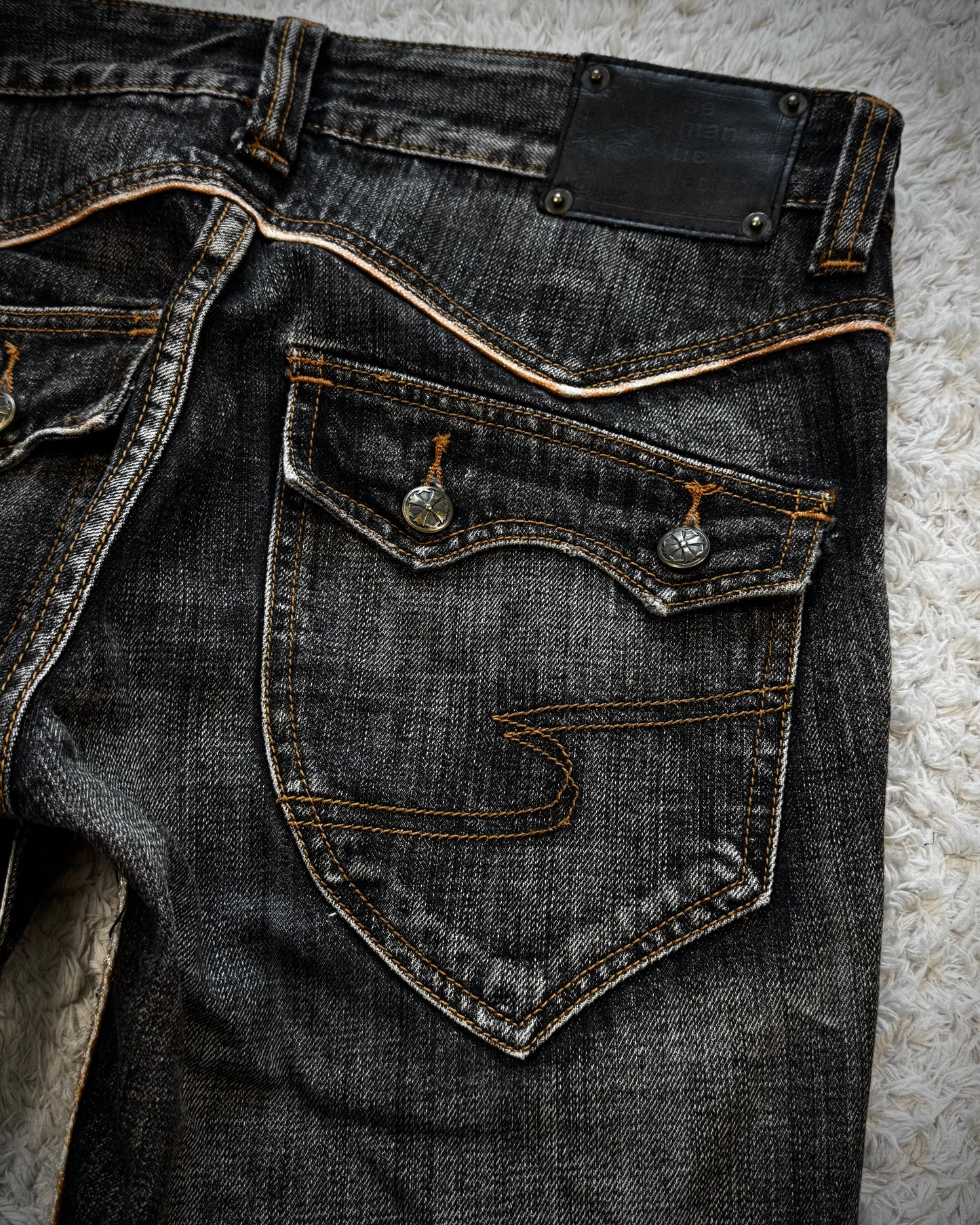 Semantic Design Slashed Whisker Washed Flared Jeans