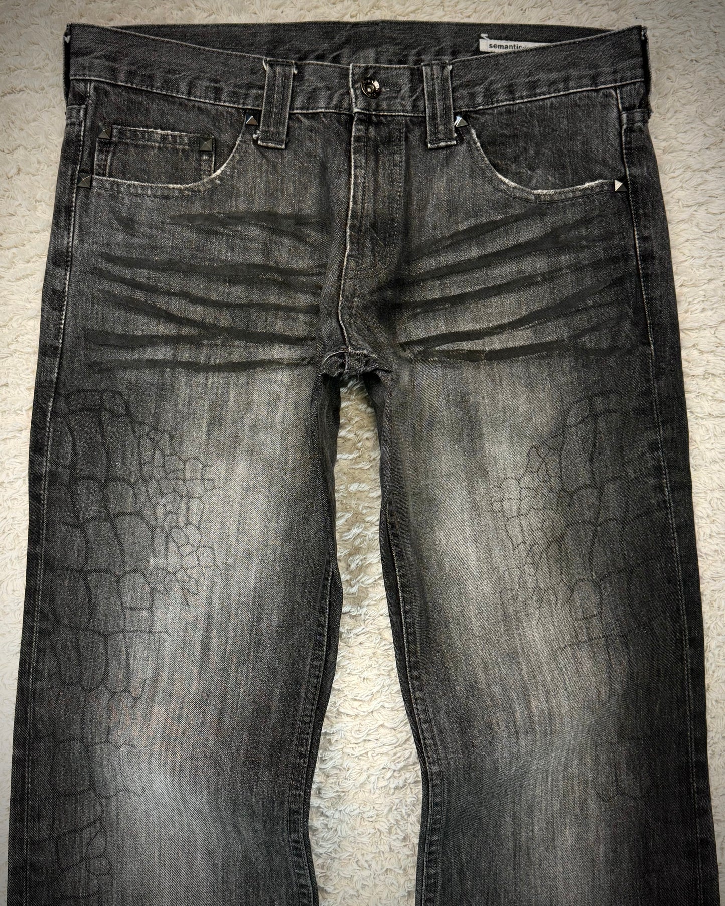 Semantic Design Crocodile Clawmarks Coated Flared Jeans