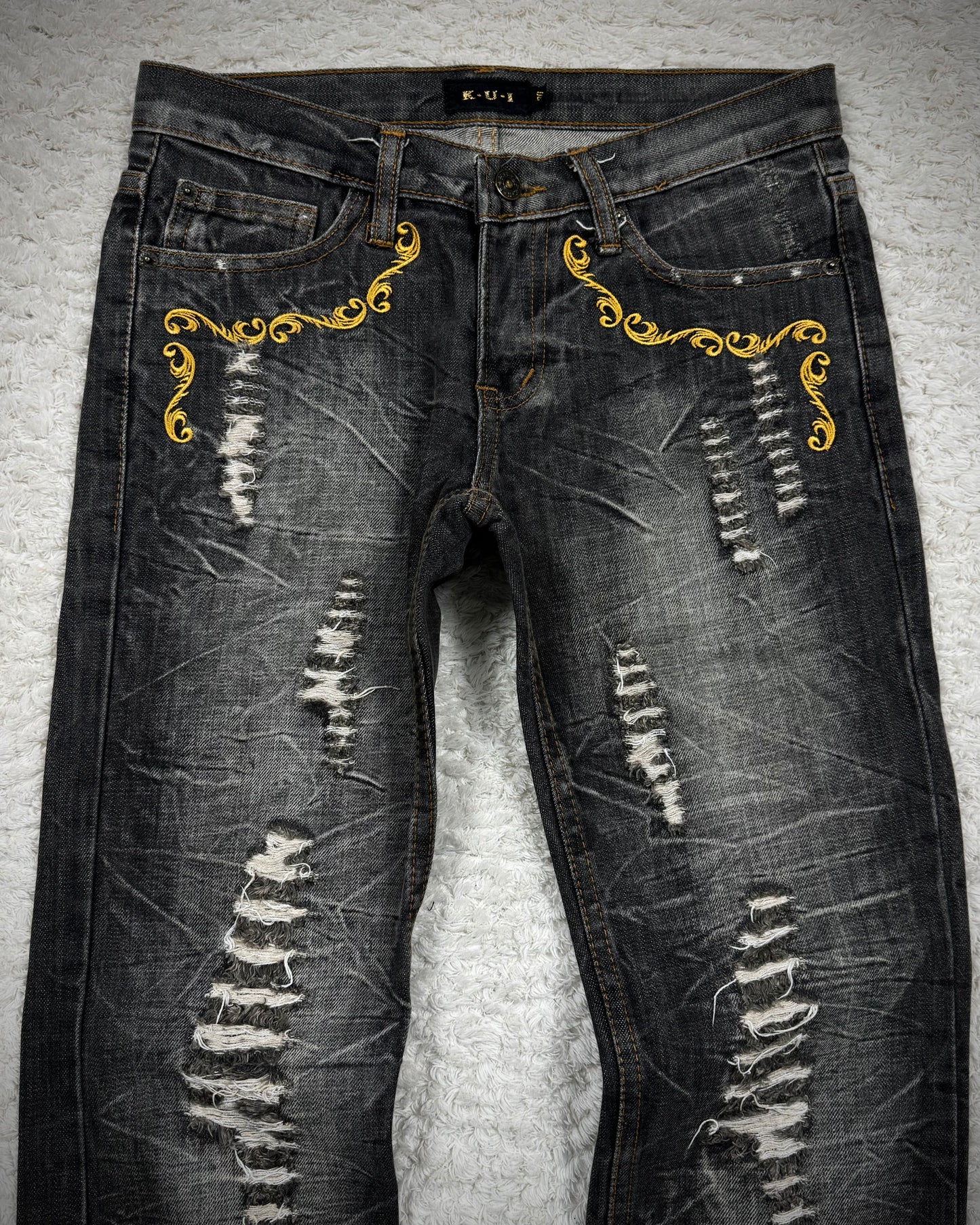 K.U.I Tribal Embroidery Distressed Bootcut Jeans
