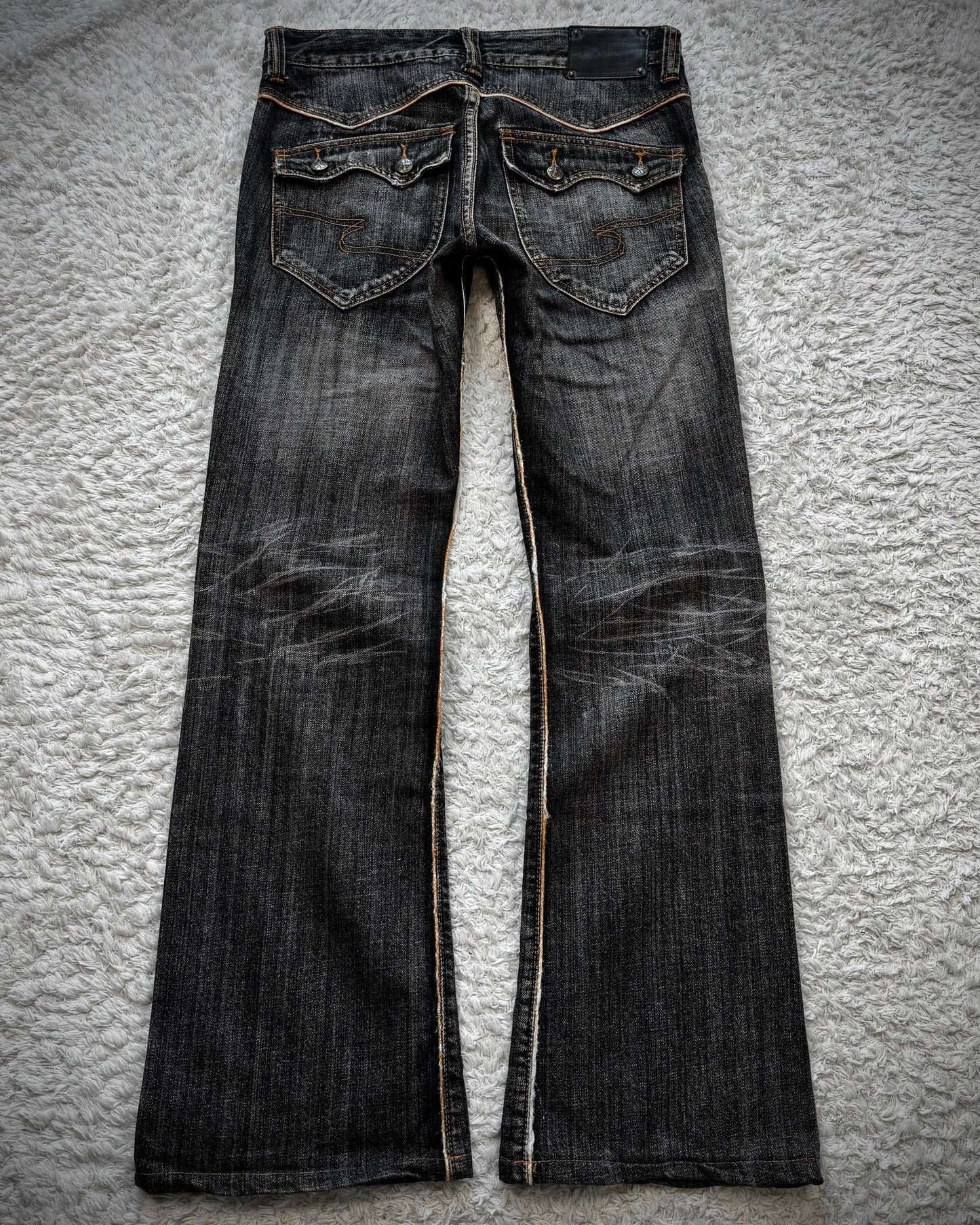 Semantic Design Slashed Whisker Washed Flared Jeans
