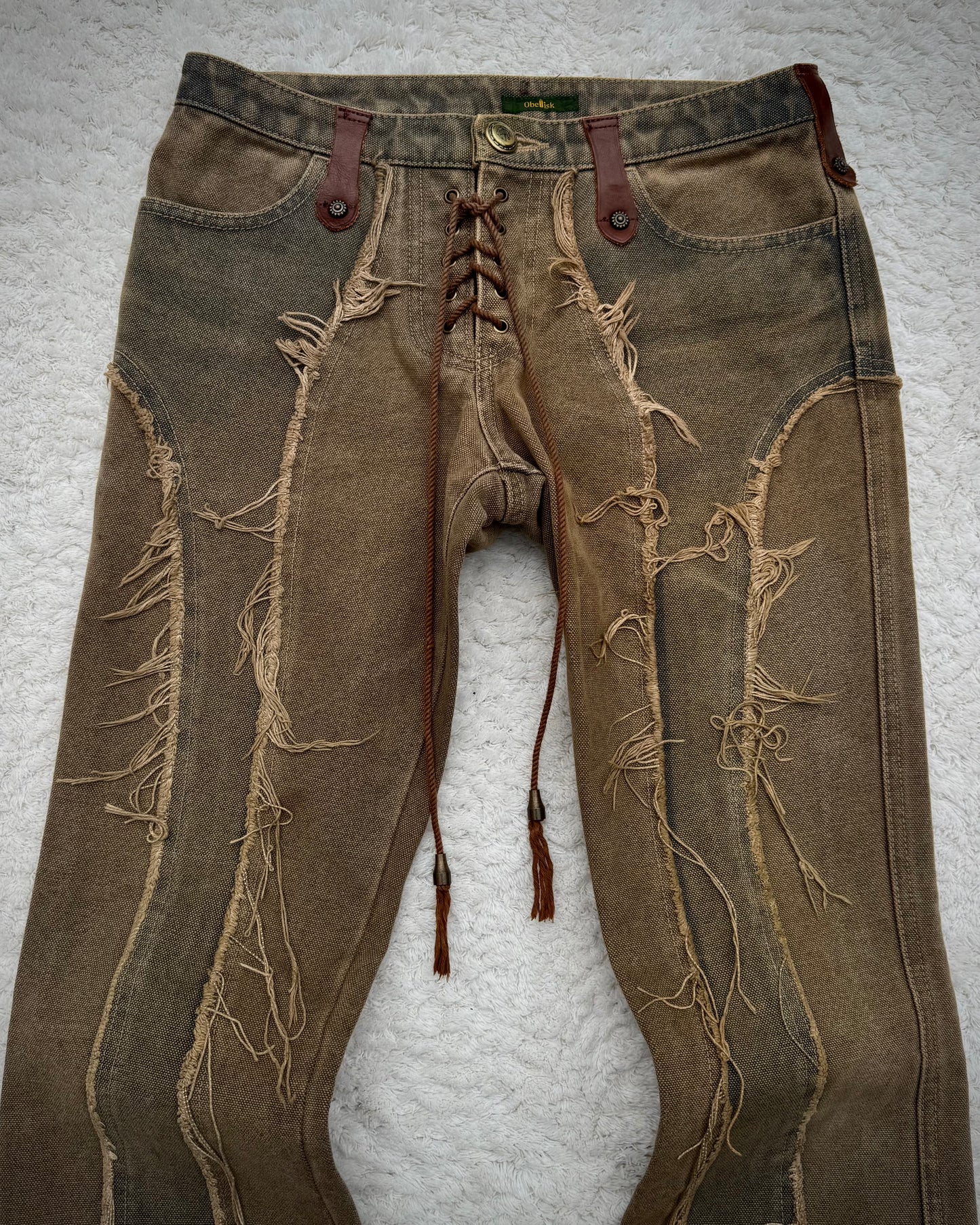 Obelisk Fringed Mud Washed Lace Up Flared Jeans