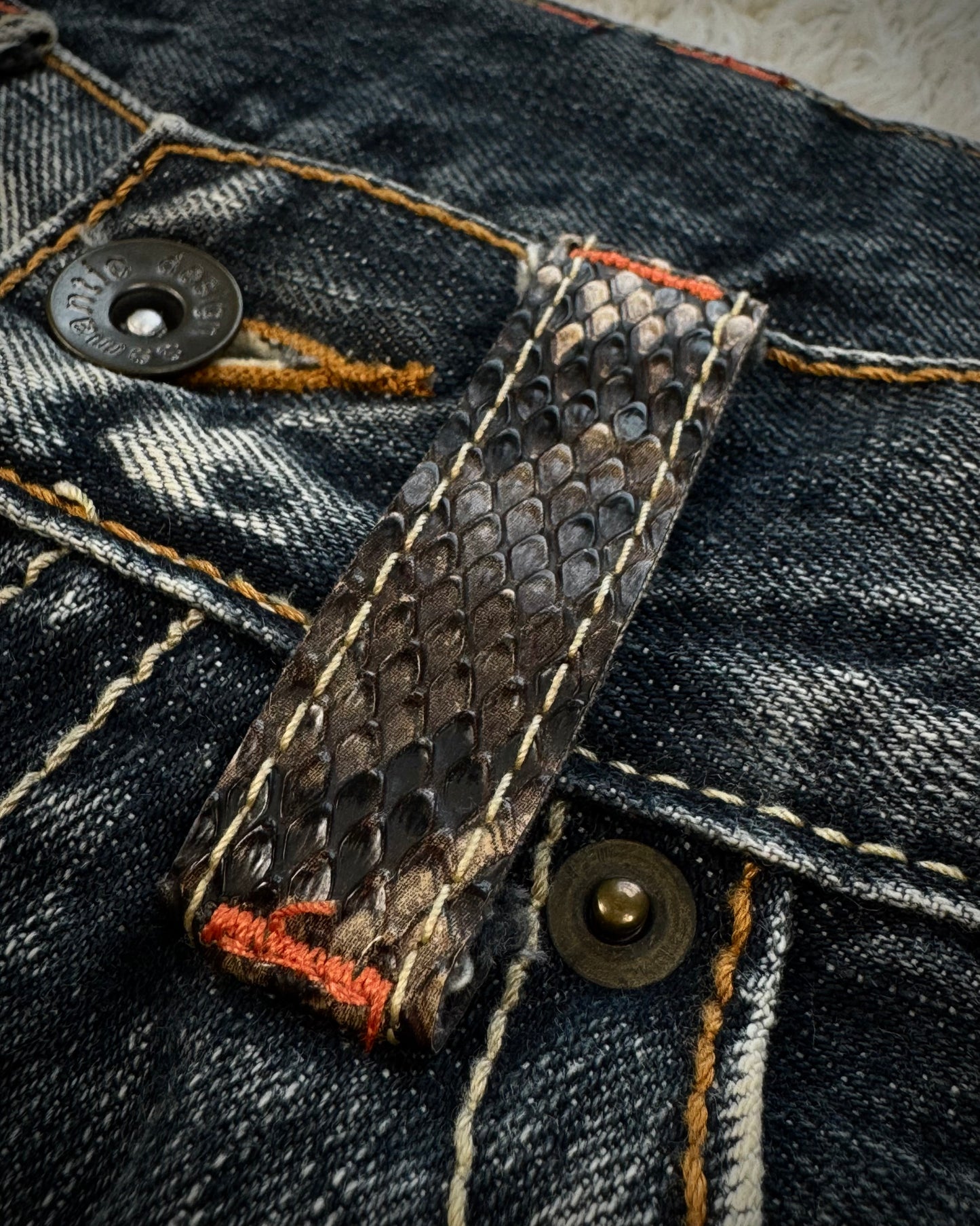 Semantic Design Python Pocket Detailed Spiral Flared Jeans
