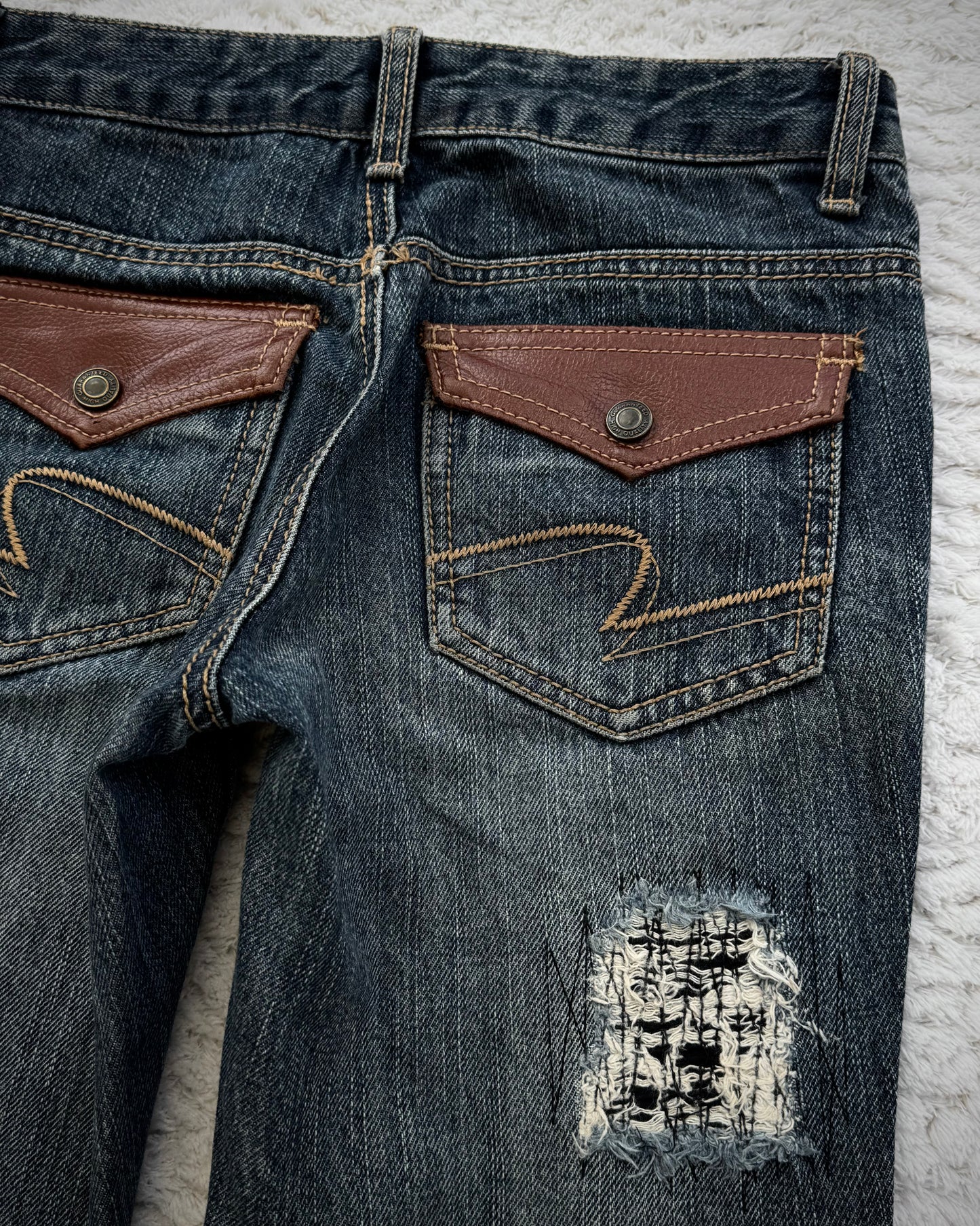 Elvence Repaired Western Spiral Flared Jeans