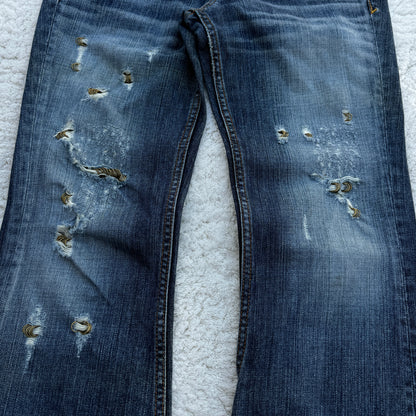 Sweet Camel Pierced Distressed Flared Jeans