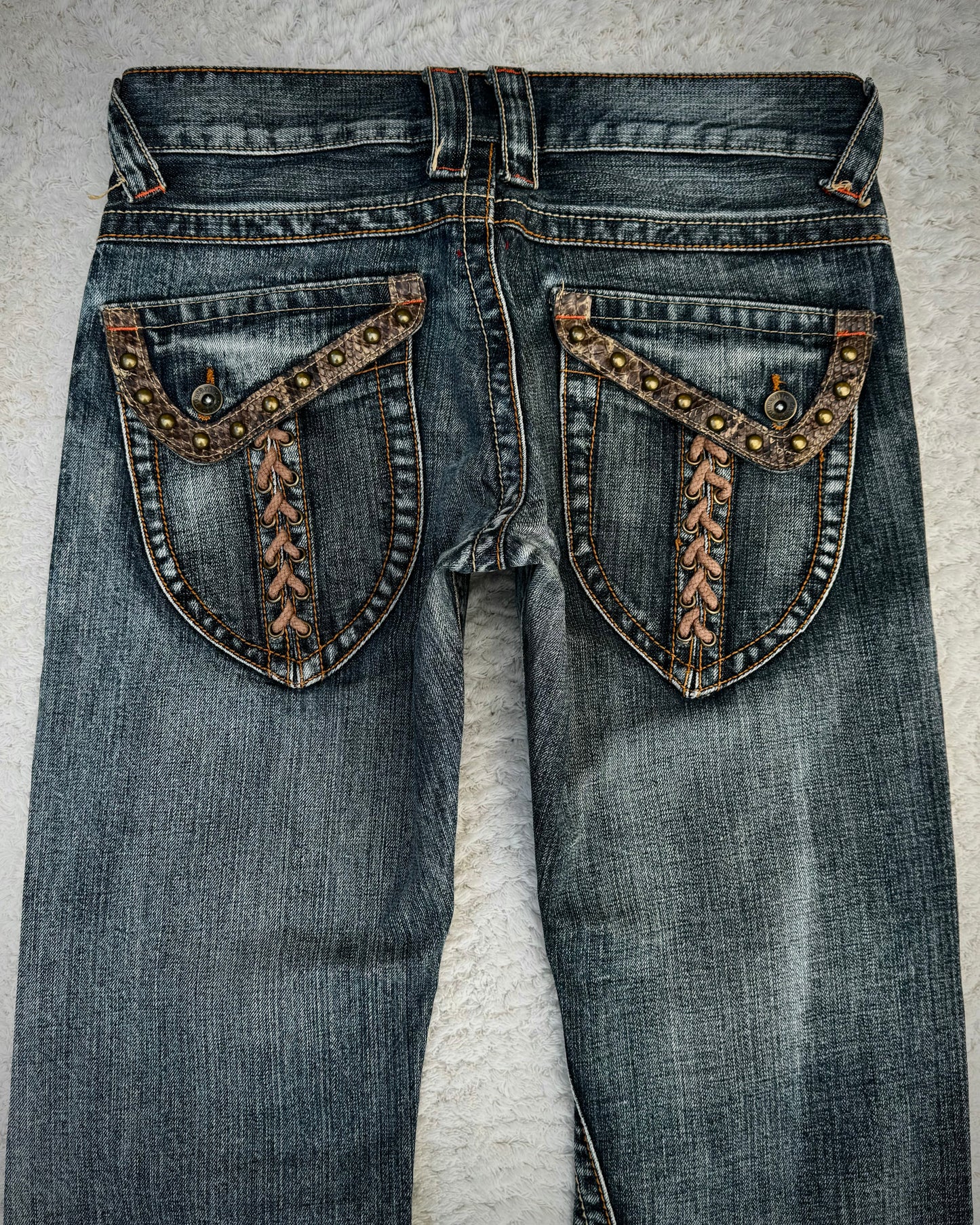 Semantic Design Studded Python Lace Up Flared Jeans