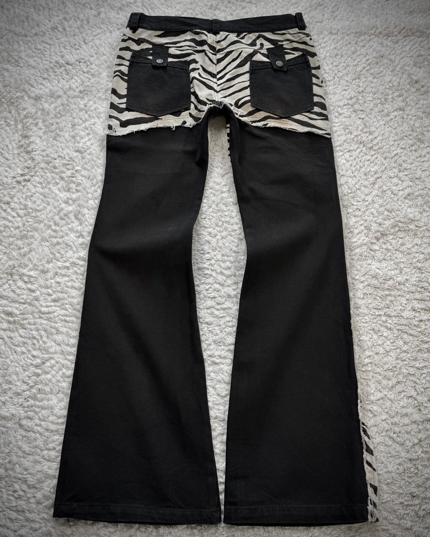 The Space Between Us Zebra Lace Up Flared Pants
