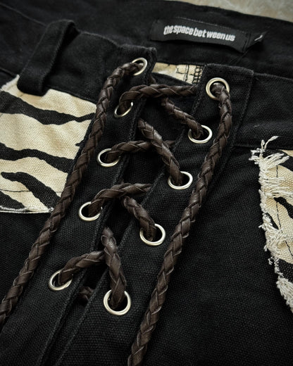 The Space Between Us Zebra Lace Up Flared Pants
