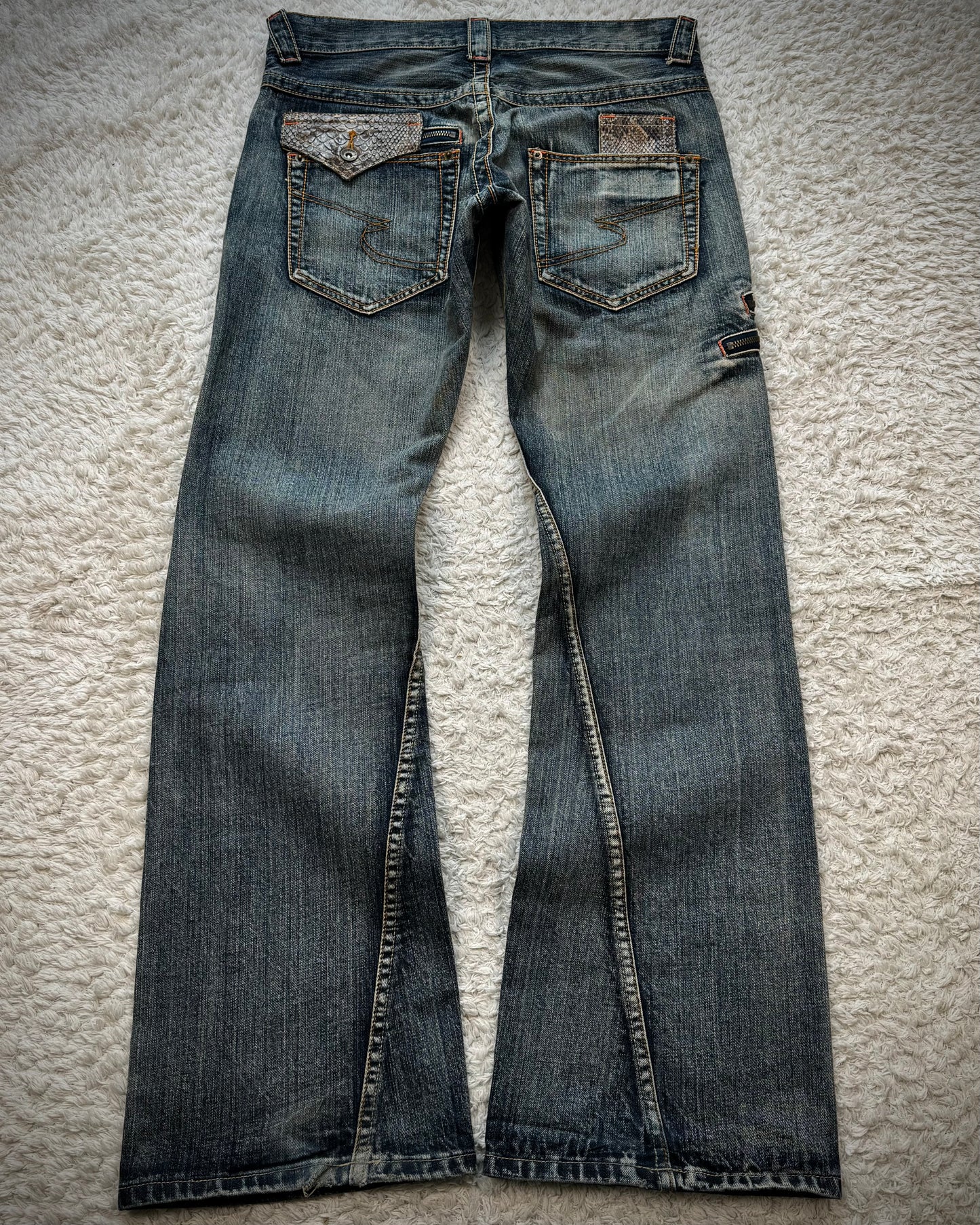 Semantic Design Python Pocket Detailed Spiral Flared Jeans