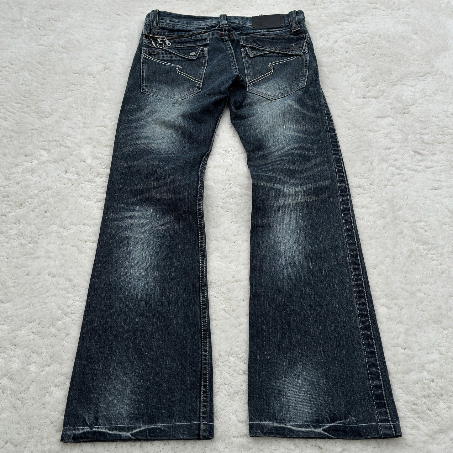 Semantic Design Zippered Flared Jeans