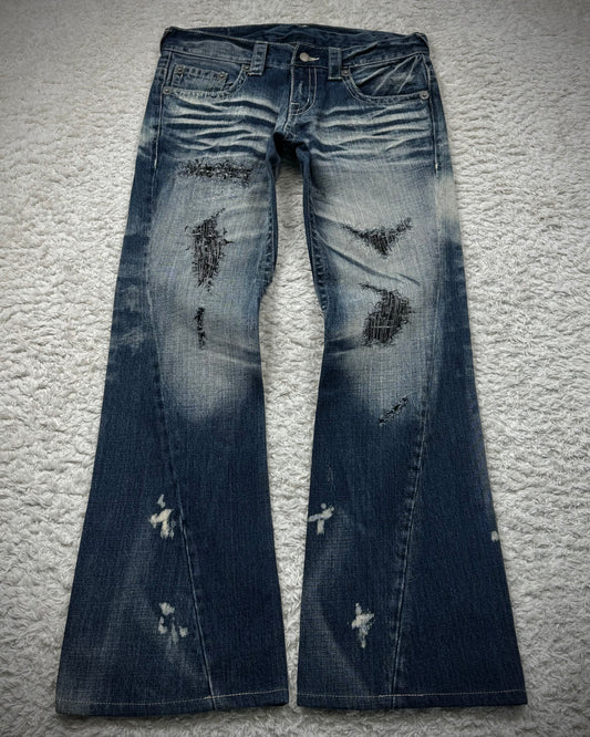 Tornado Mart Stitch Repaired Clawmarks Washed Spiral Flared Jeans