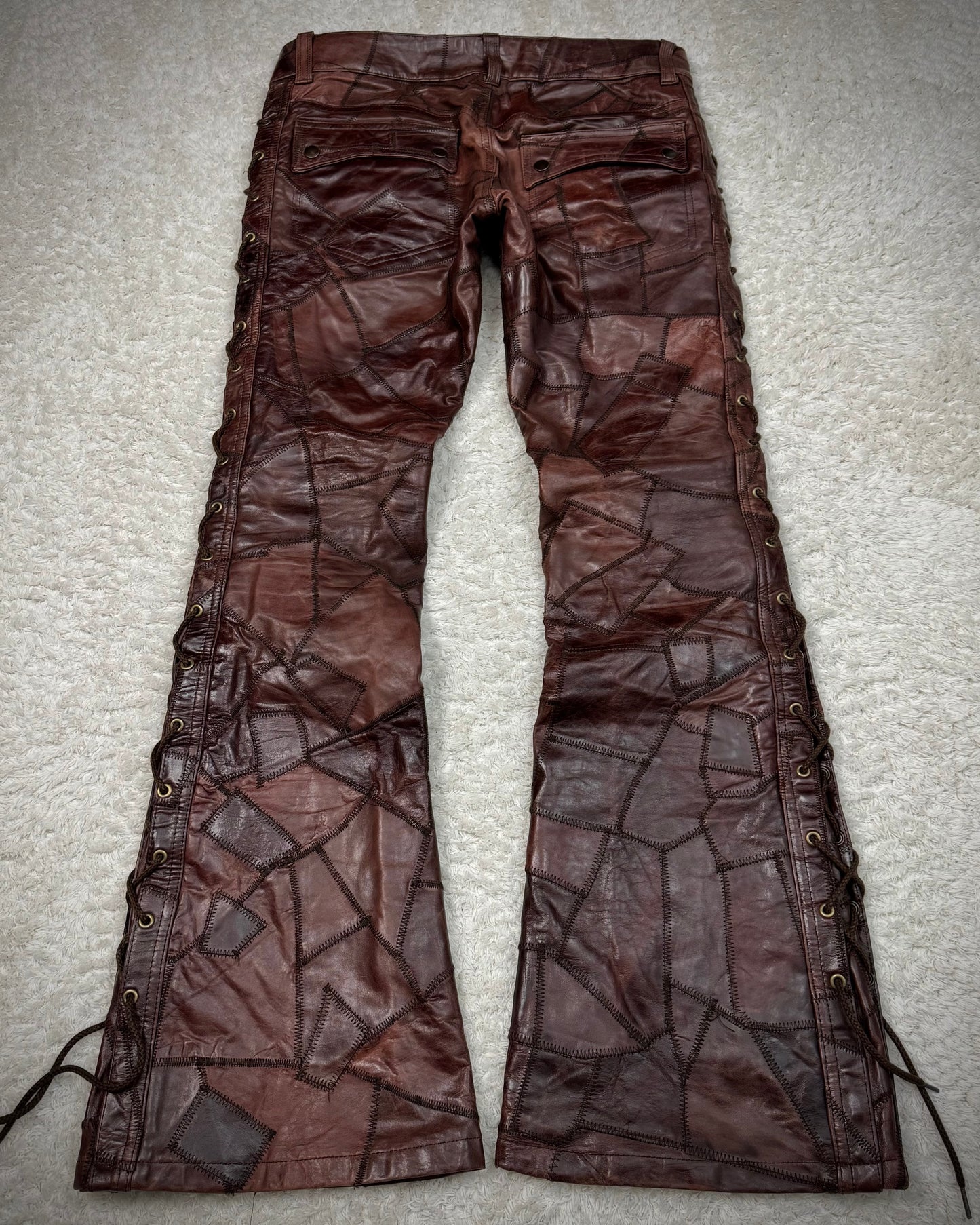 Tornado Mart Oxblood Scar Stitched Leather Patchwork Lace Up Flared Pants