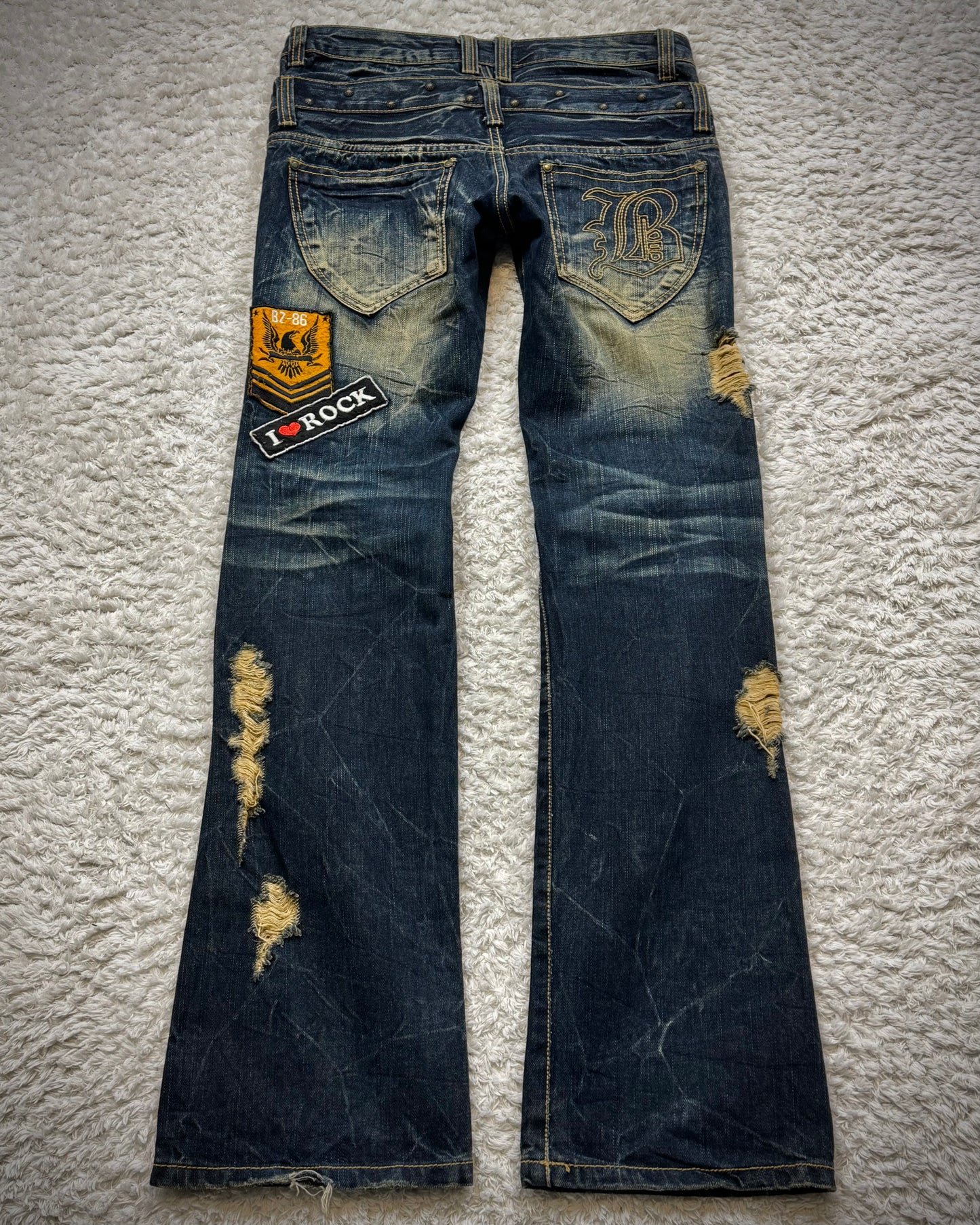 Buzz Spunky Double Waisted Lace Up Studded Flared Jeans