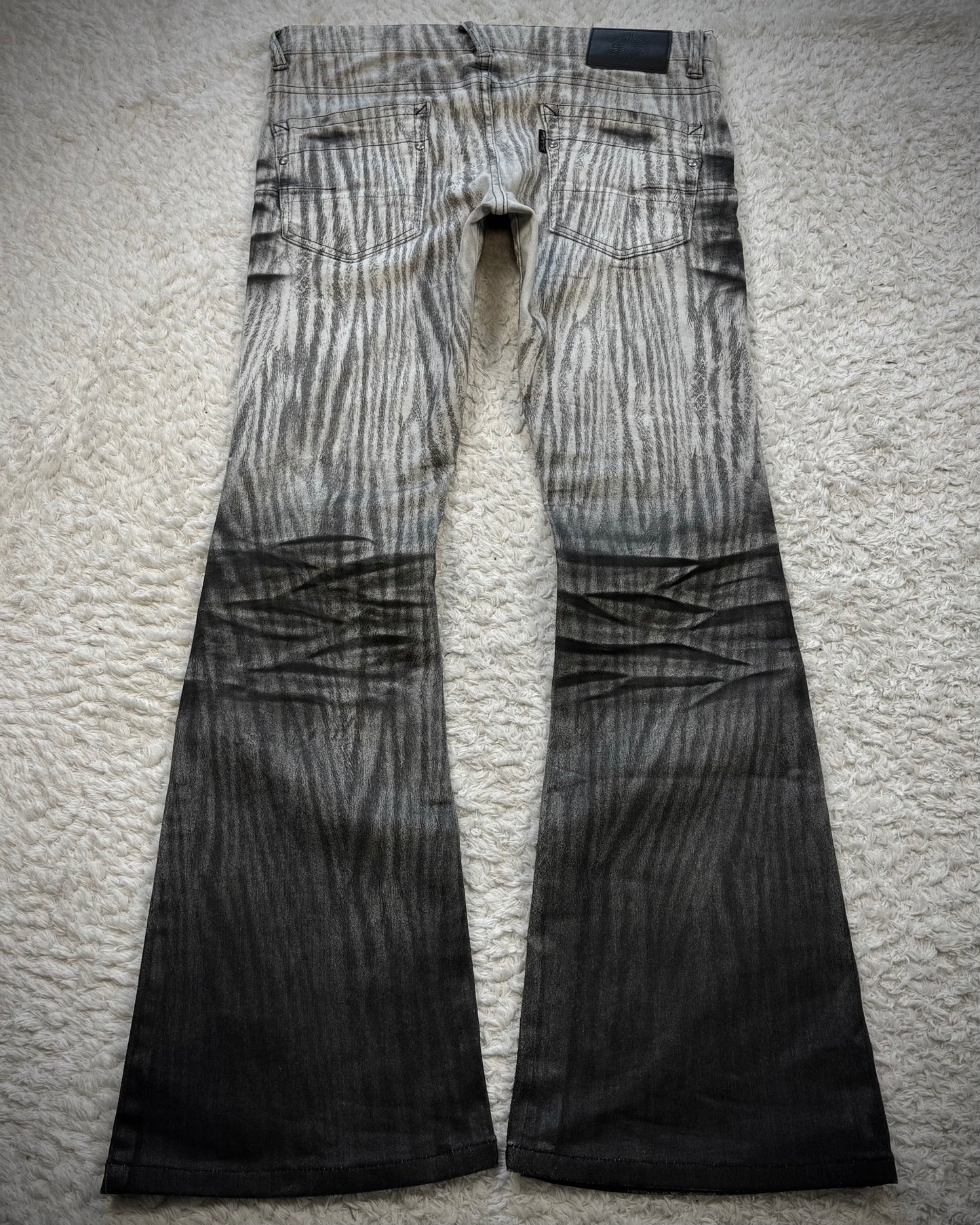 Tornado Mart Zebra Clawmarks Coated Flared Jeans