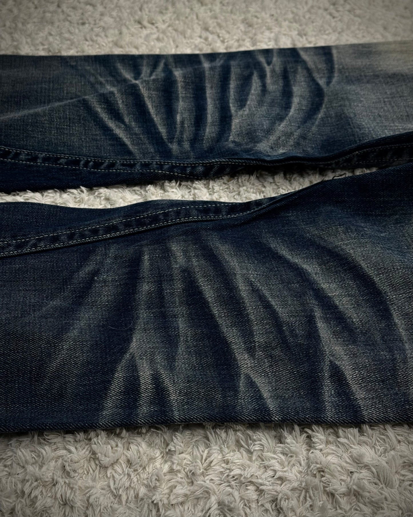 Tornado Mart Stitch Repaired Clawmarks Washed Spiral Flared Jeans
