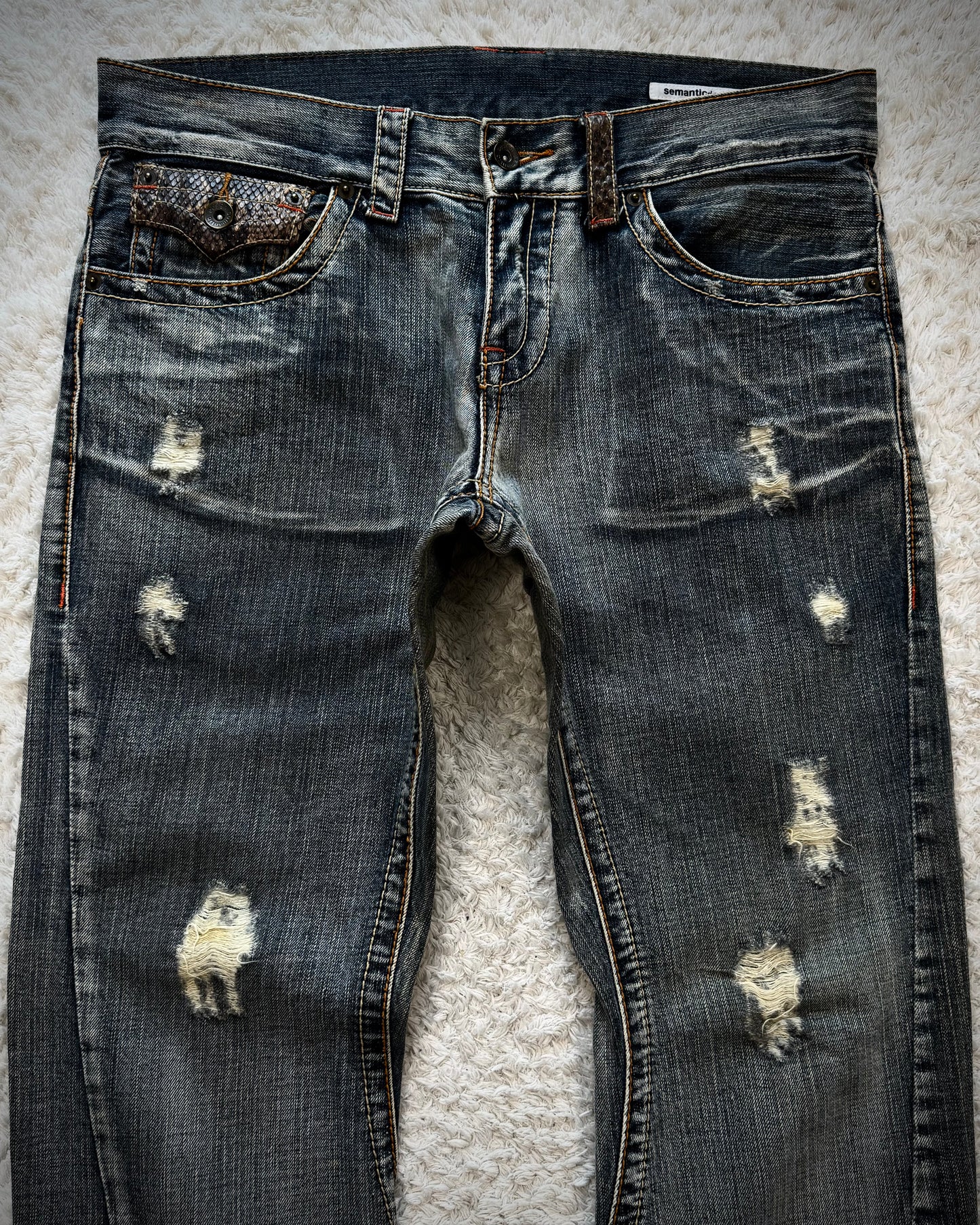 Semantic Design Python Detailed Spiral Flared Jeans