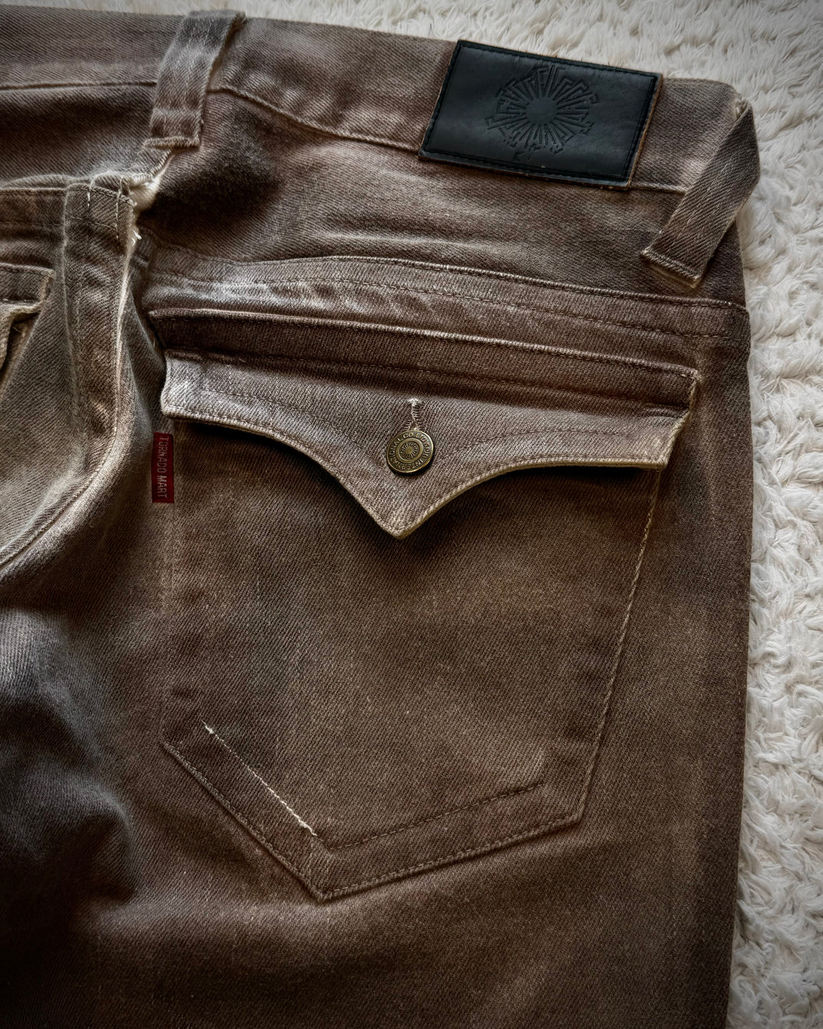 Tornado Mart Flap Mud Whisker Washed Spiral Flared Jeans