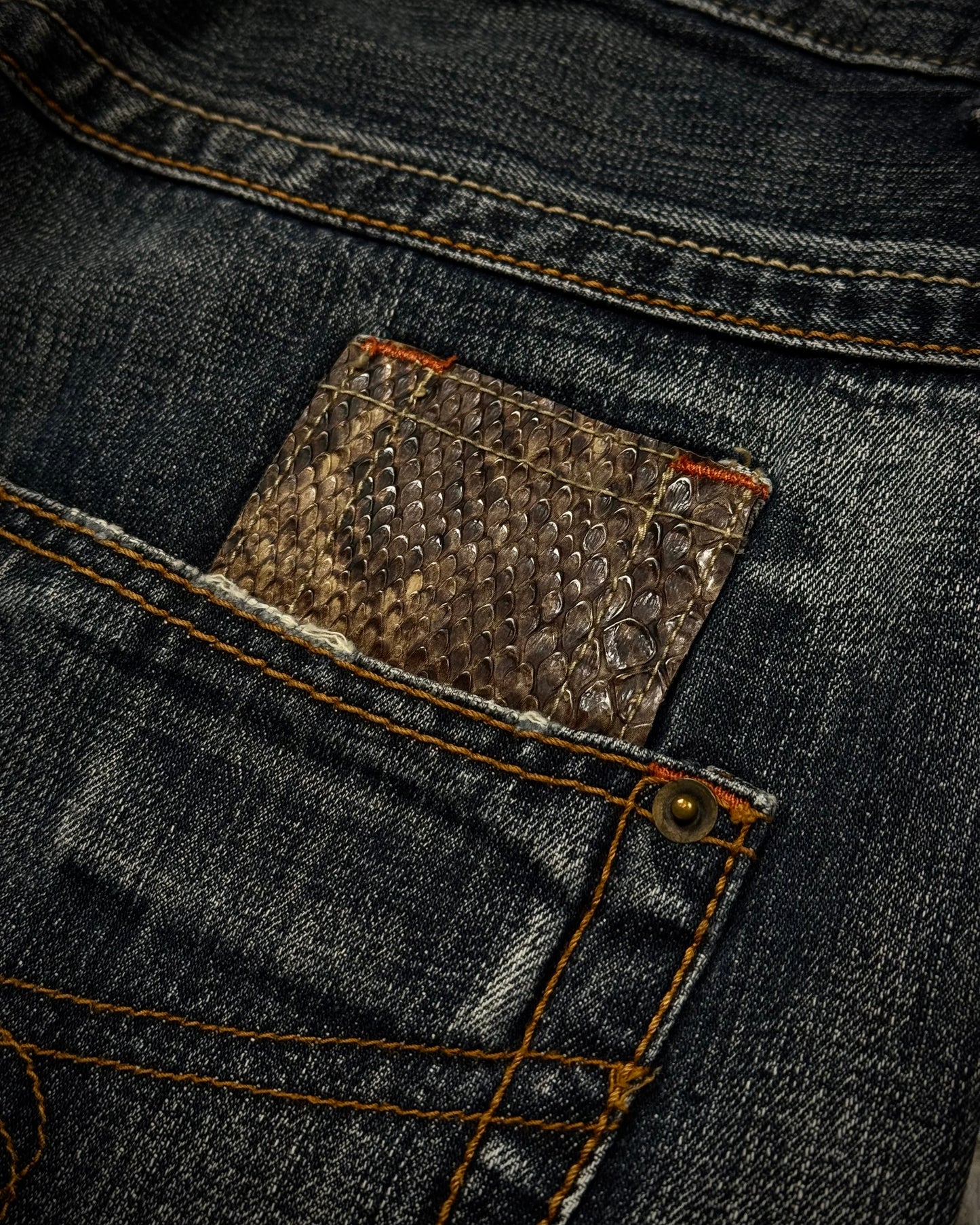 Semantic Design Python Detailed Zippered Spiral Flared Jeans