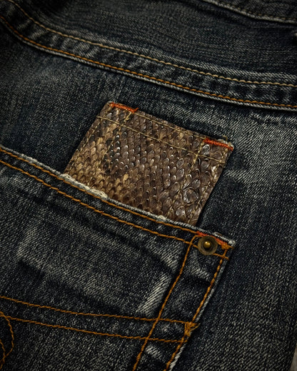 Semantic Design Python Detailed Zippered Spiral Flared Jeans