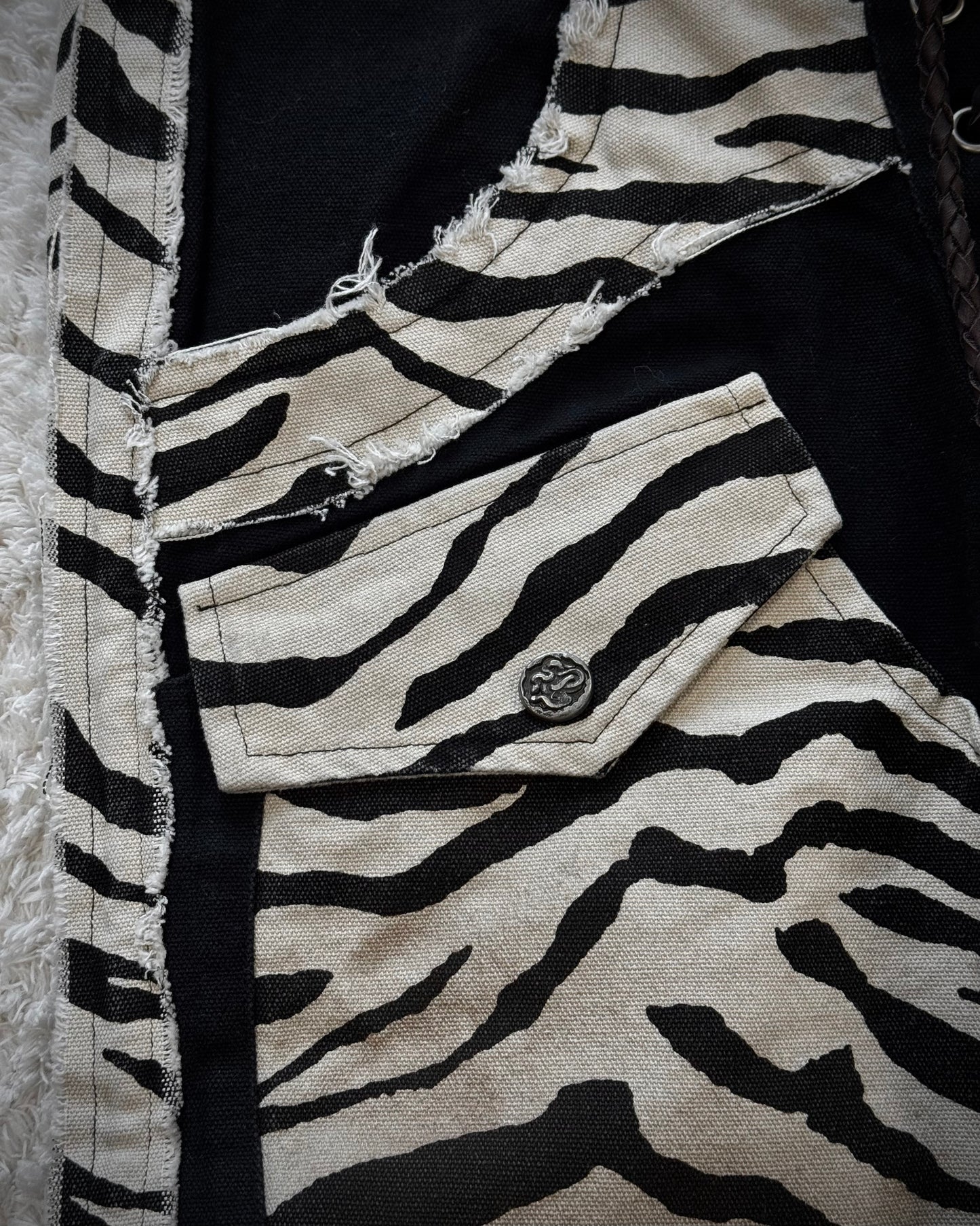 The Space Between Us Zebra Lace Up Flared Pants