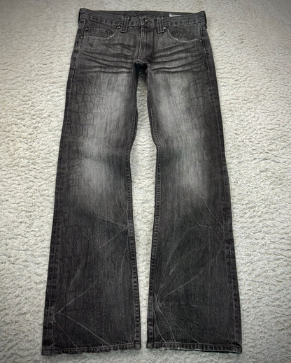 Semantic Design Crocodile Clawmarks Coated Flared Jeans